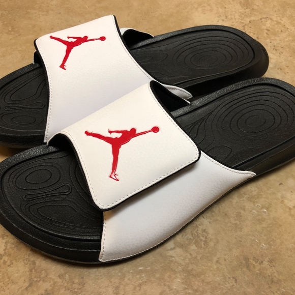 white and red jordan slides